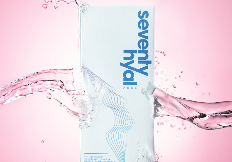Seventy Hyal box on a pink background with water weaving around the box